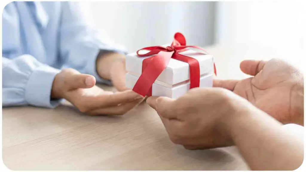a person giving a gift to another person